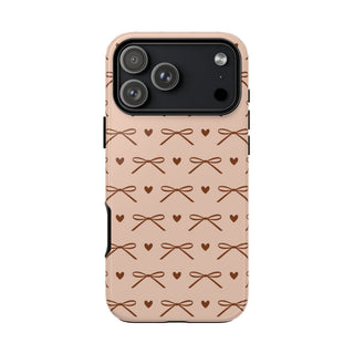 Brown bow tough phone case with tiny hearts on peach pink