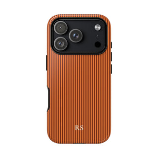 Personalized burnt orange striped tough phone case with cream monogram