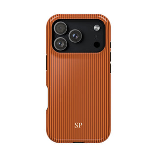 Personalized burnt orange striped MagSafe phone case with initials, back view