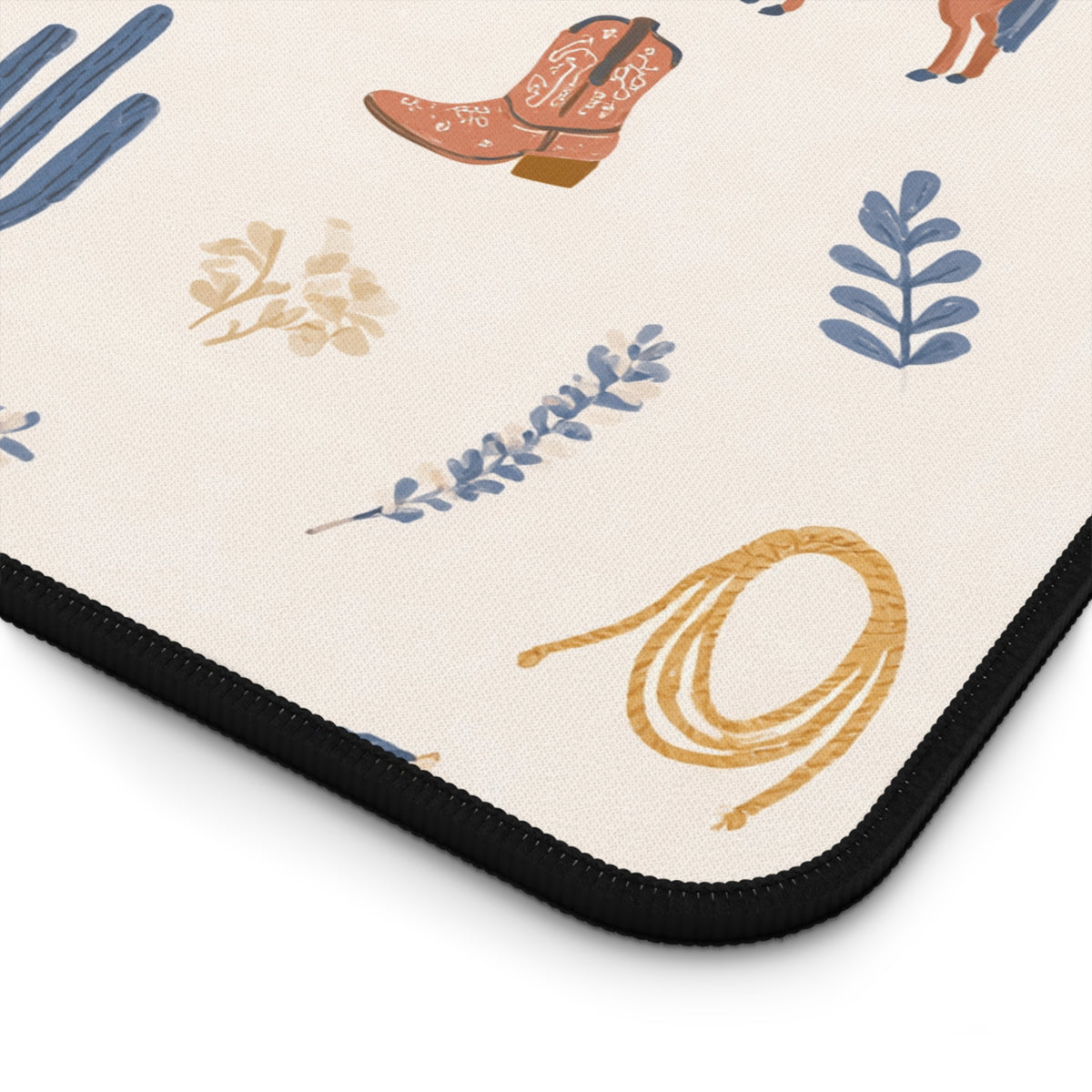 Horse and cactus desk mat styled on a wooden desk with warm neutral decor