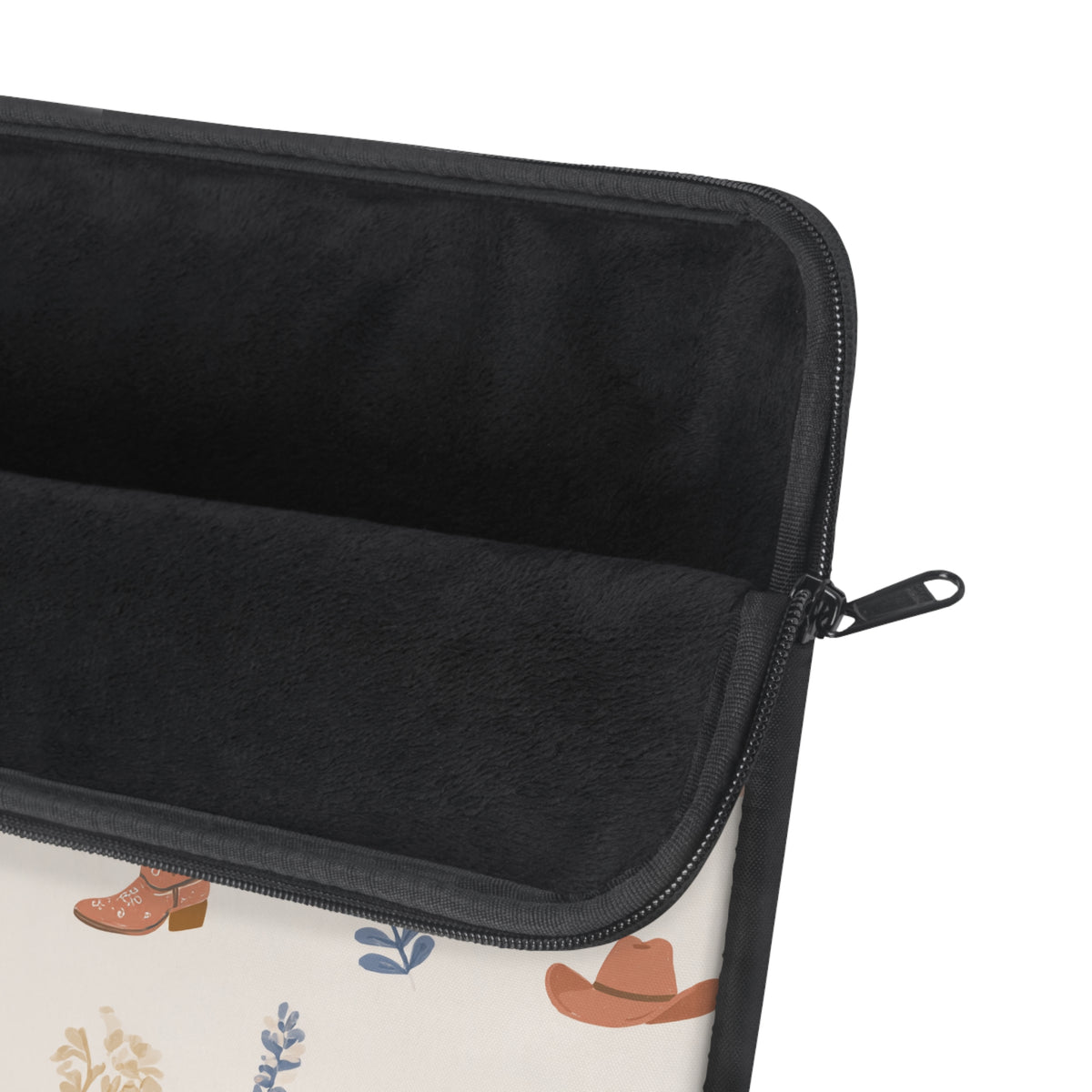 Boho western laptop sleeve carried under an arm on a neutral background