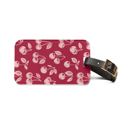 Red cherry luggage tag, detail view
