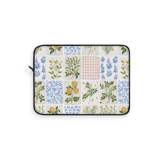 Floral patchwork laptop sleeve in blue, yellow and cream