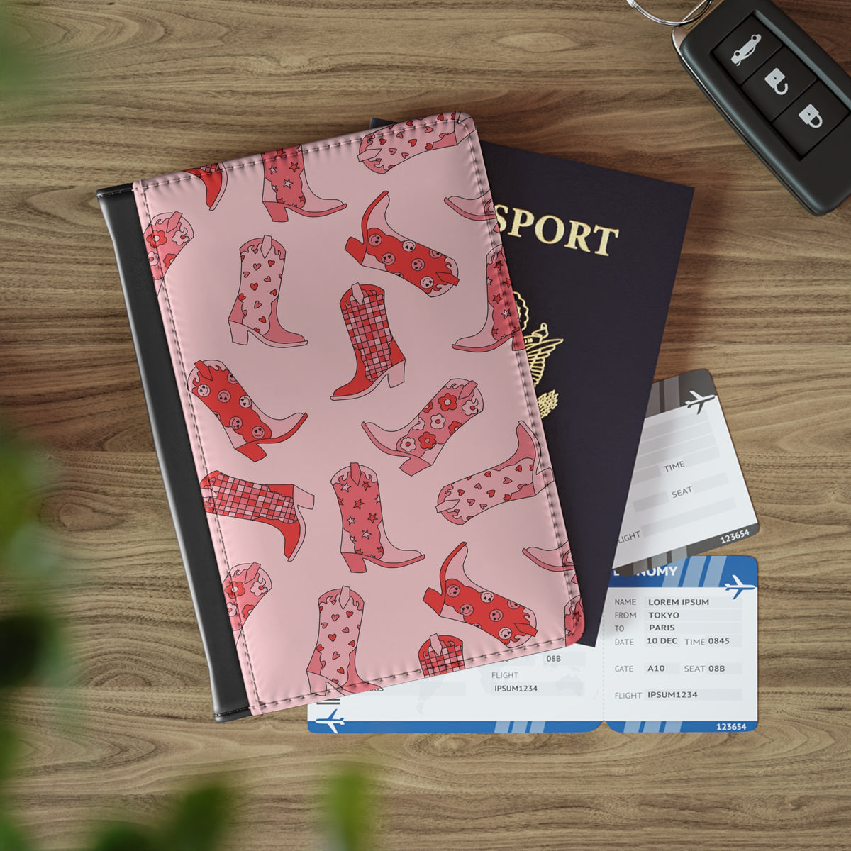 Cowboy boot print passport cover held in hand
