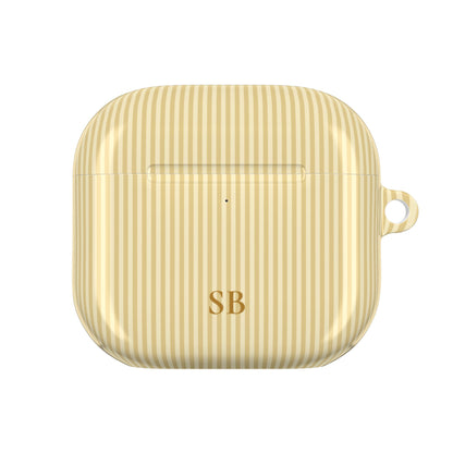 Butter yellow striped personalized AirPod case held in hand
