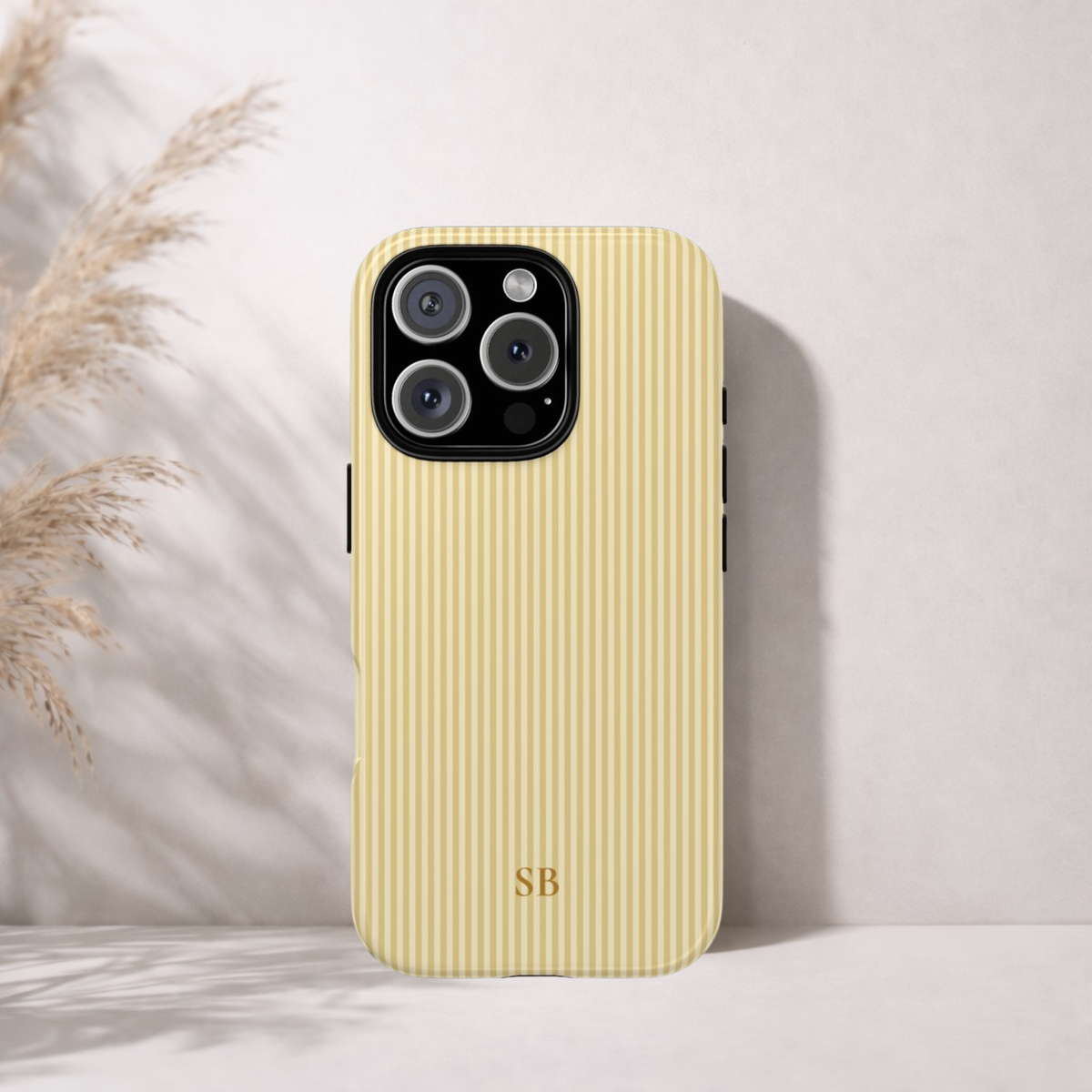 Butter yellow striped tough phone case side view showing the dual layer edge