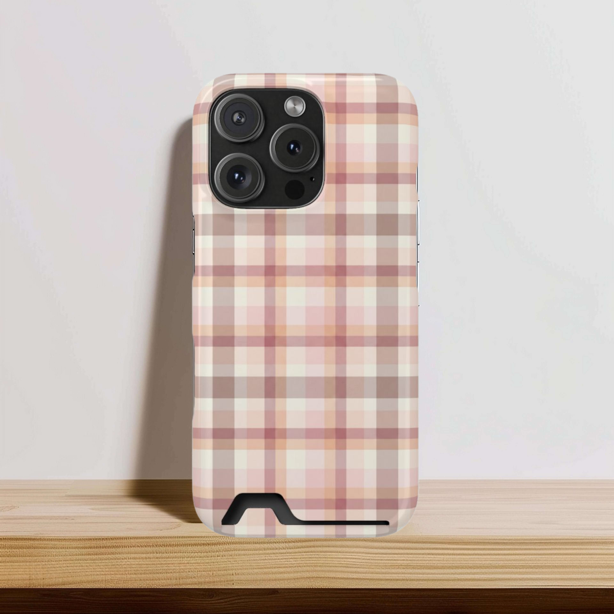 Blush plaid phone case with card holder, angled view
