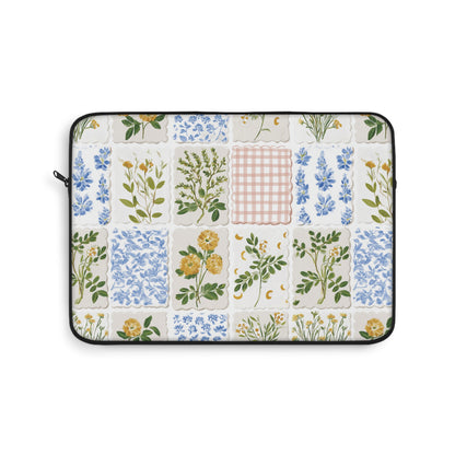 Patchwork floral laptop sleeve with a black zipper