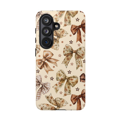 Dual layer bow phone case in warm cream and chocolate brown