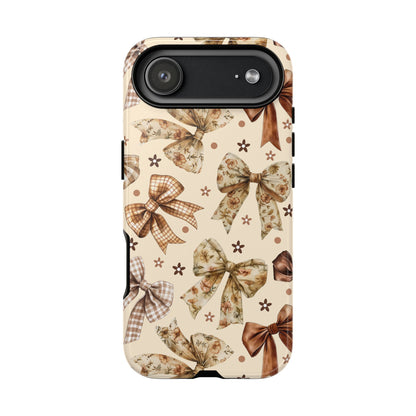 Neutral bow phone case held in hand