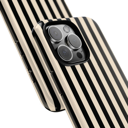 Black and cream striped tough phone case in everyday use