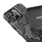 Black lace print MagSafe phone case in hand