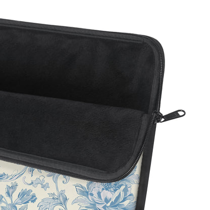 Blue toile laptop sleeve with black zipper and edging