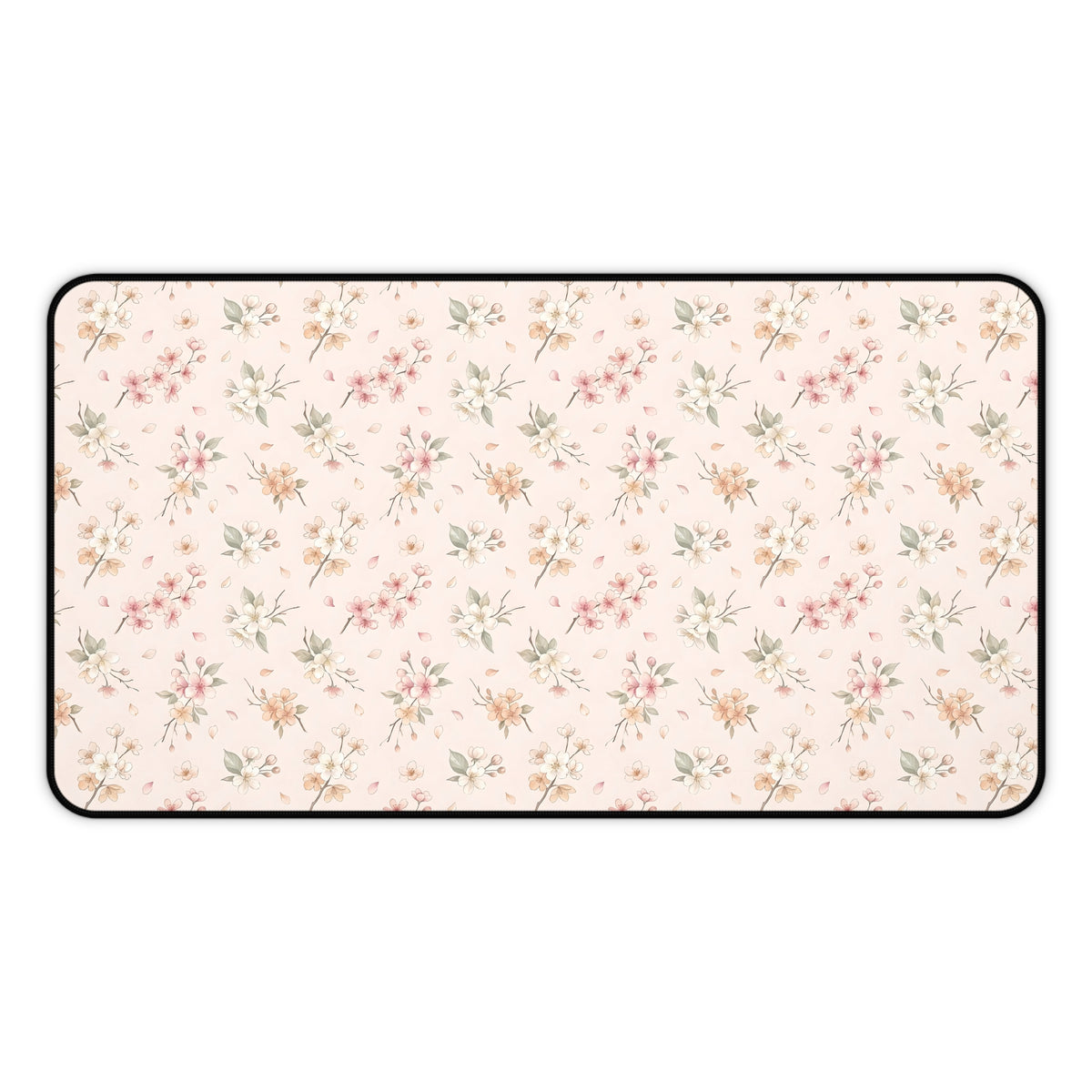 Blush floral desk mat with a scattered blossom print