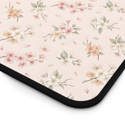 Blush pink blossom print desk mat with hemmed edges