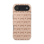 Brown bow MagSafe phone case, detail of the print
