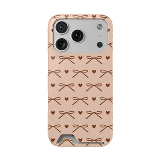 Brown bow phone case with card holder, tiny hearts on peach pink