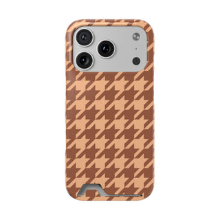 Brown houndstooth phone case with card holder on peachy tan