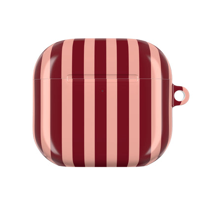 Wide stripe AirPod case in burgundy and blush, side view