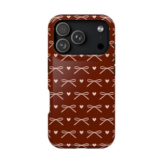 Burgundy bow MagSafe phone case, back view