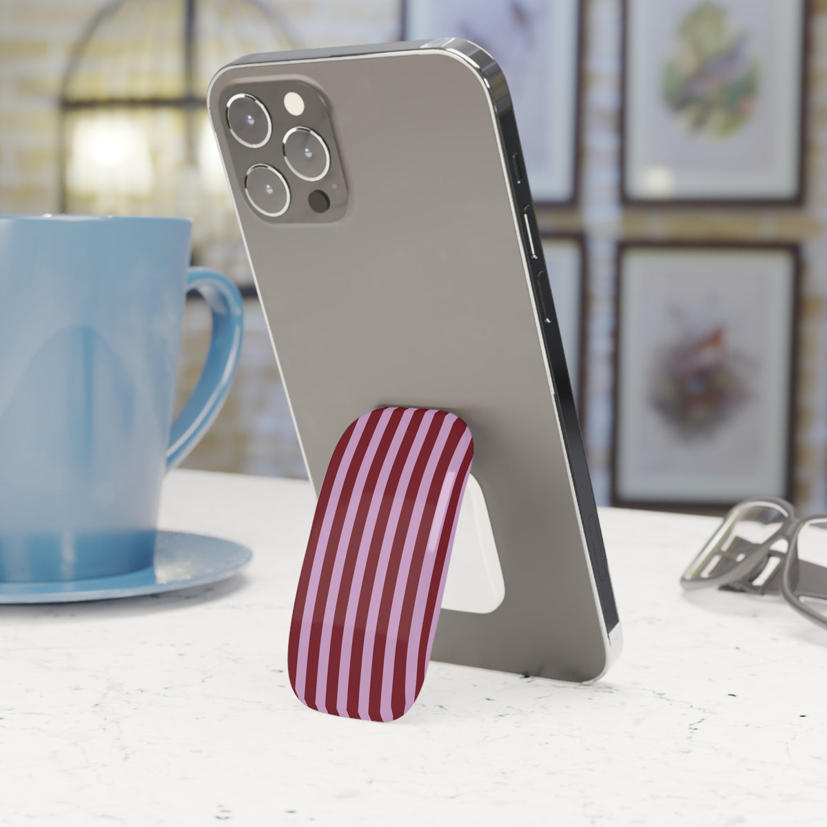 Striped phone grip on the back of a phone