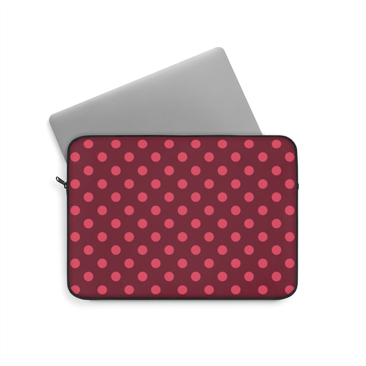 Polka dot laptop sleeve in burgundy with a black YKK zipper