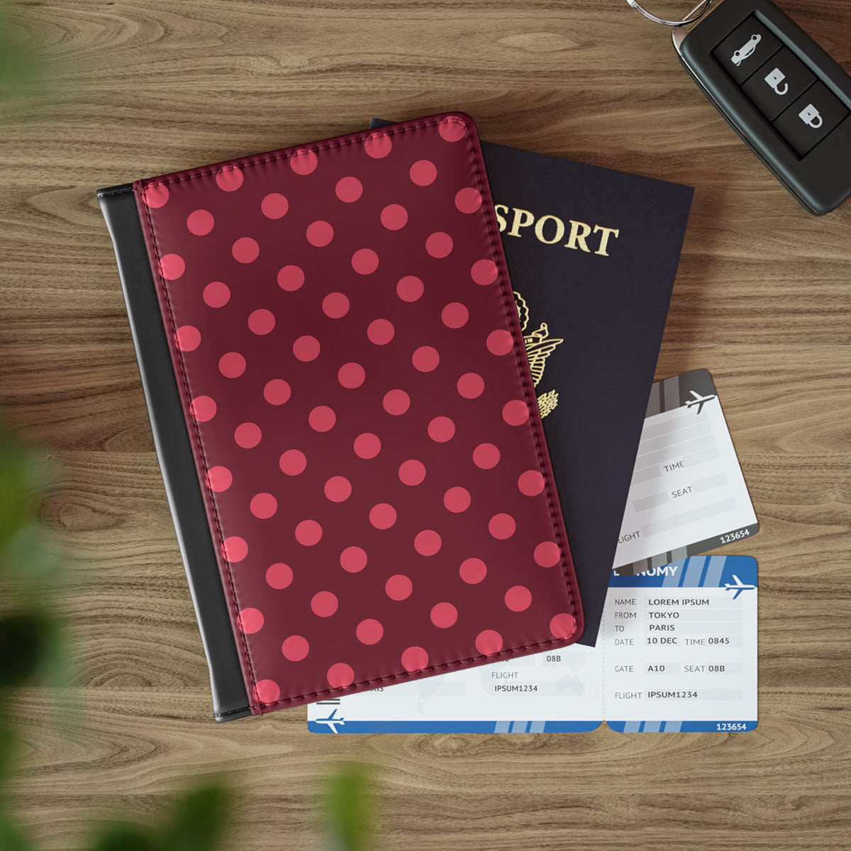 Polka dot passport cover in burgundy with black faux leather spine