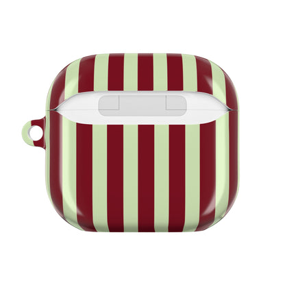 Striped AirPod case held in hand