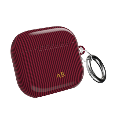 Personalized burgundy striped AirPod case with gold monogram