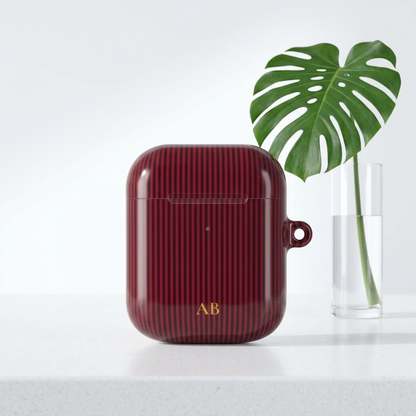 Burgundy pinstripe print with gold monogram for personalized AirPod case