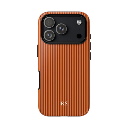 Personalized burnt orange striped tough phone case with cream monogram