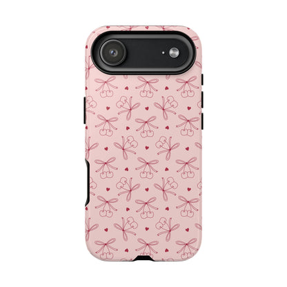 Cherry bow phone case shown on iPhone
