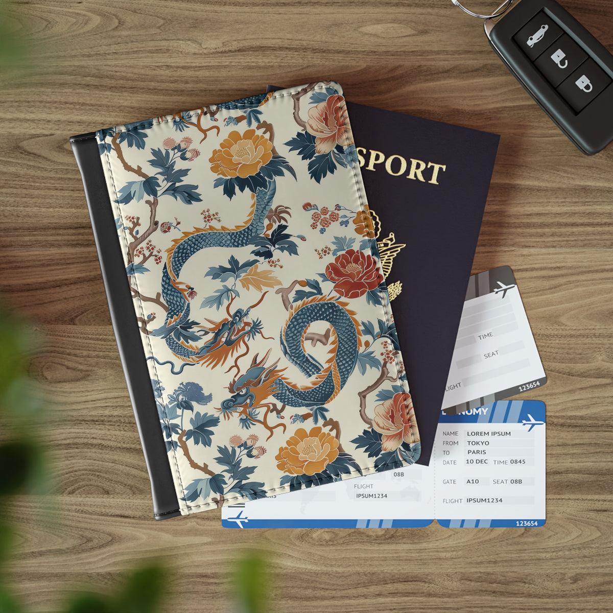 Chinoiserie dragon passport cover held in hand