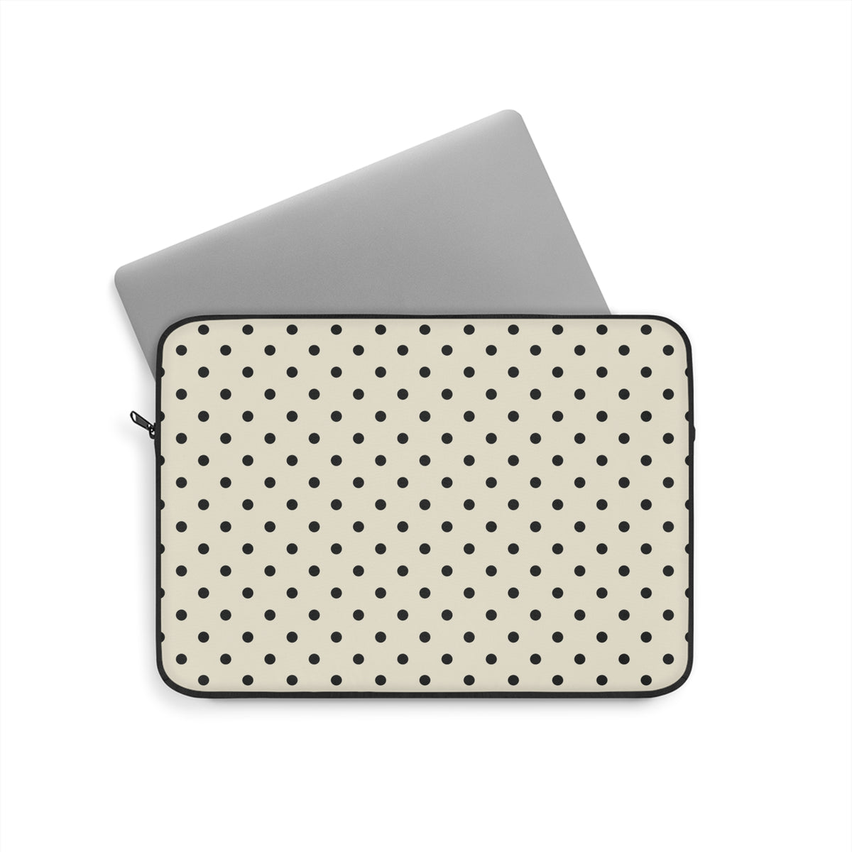 Polka dot laptop sleeve with black dots on cream