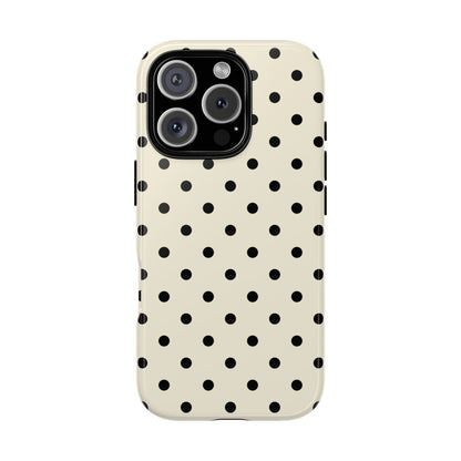 Polka dot tough phone case held in hand