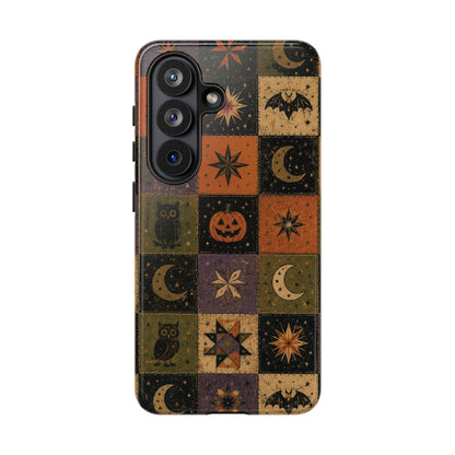 Halloween quilt tough phone case held in hand