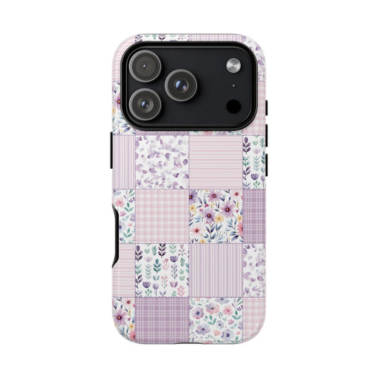 Lavender floral patchwork tough phone case, held in hand
