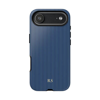 Raised edges of a navy blue striped tough phone case