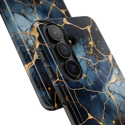 Close-up of the ochre-toned veining on the navy marble print tough case