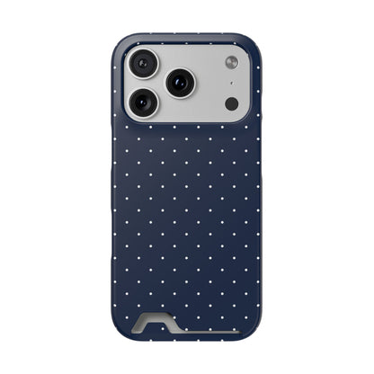 Navy polka dot phone case held in hand