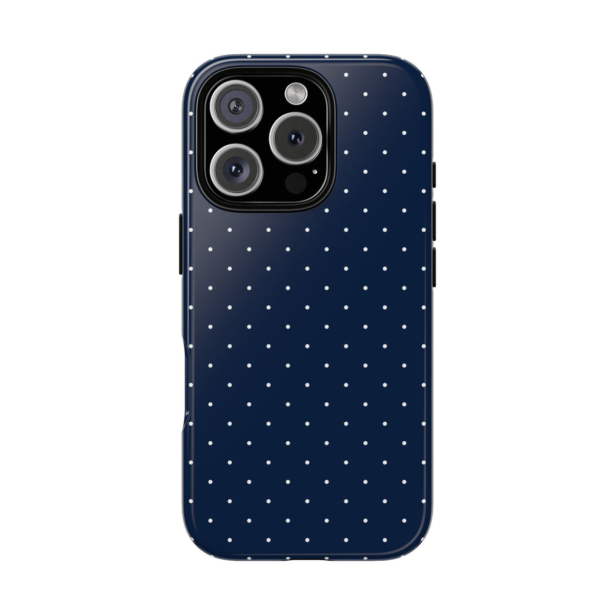 Navy polka dot tough phone case held in hand