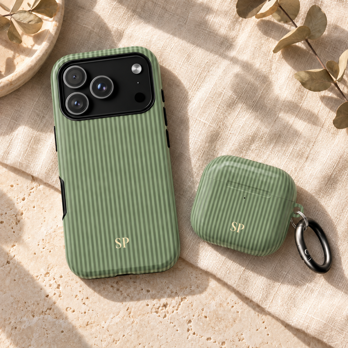 Green striped tough phone case with matching AirPod case