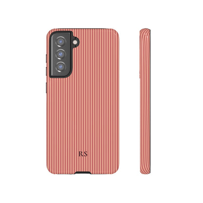 Personalized coral striped tough phone case, close-up of initials