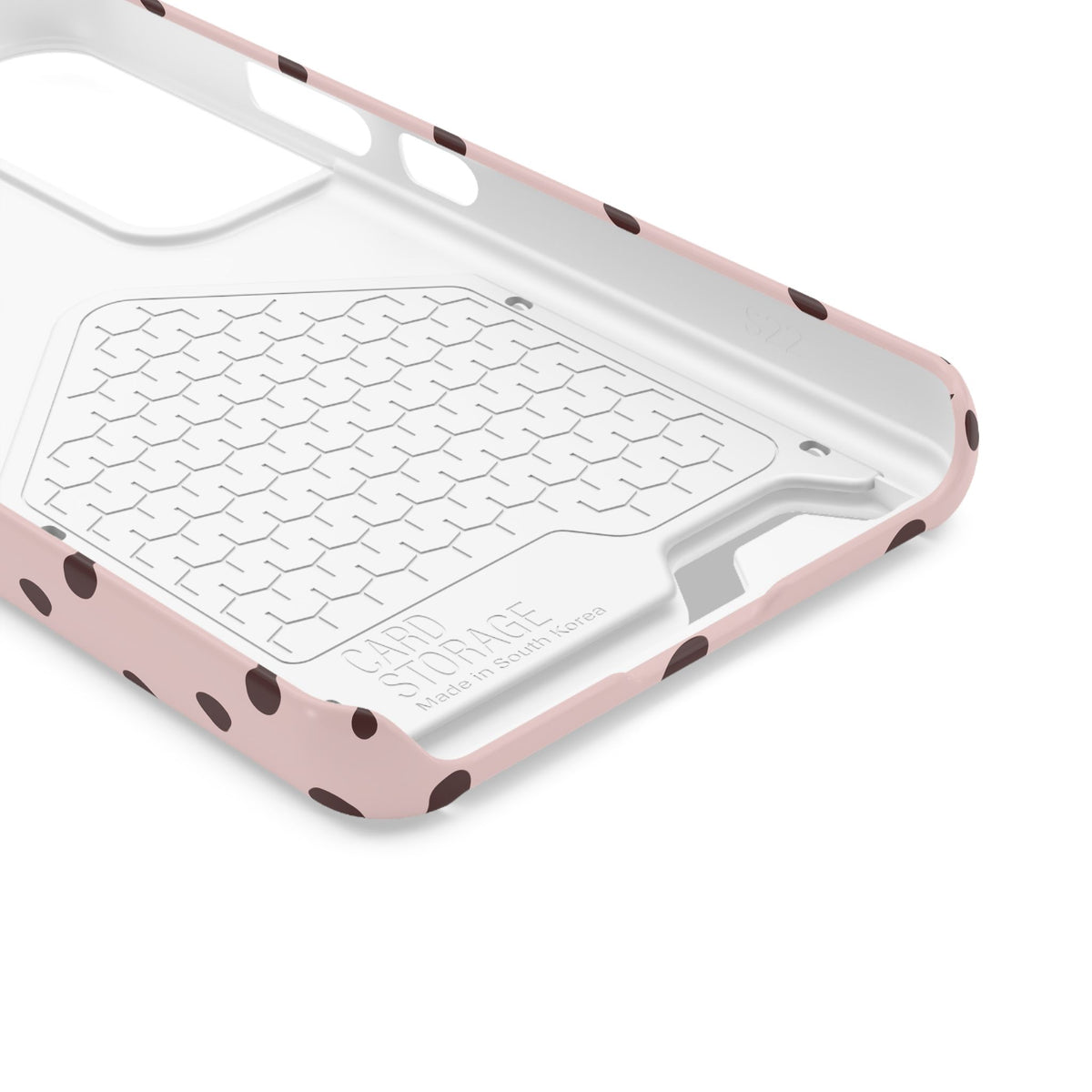Pink and brown polka dot phone case with card holder, lifestyle view