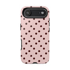 Pink and brown polka dot tough phone case, detail view