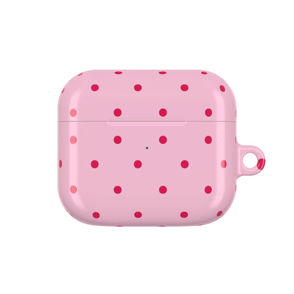 Pink and red dotted AirPod case seen from the side