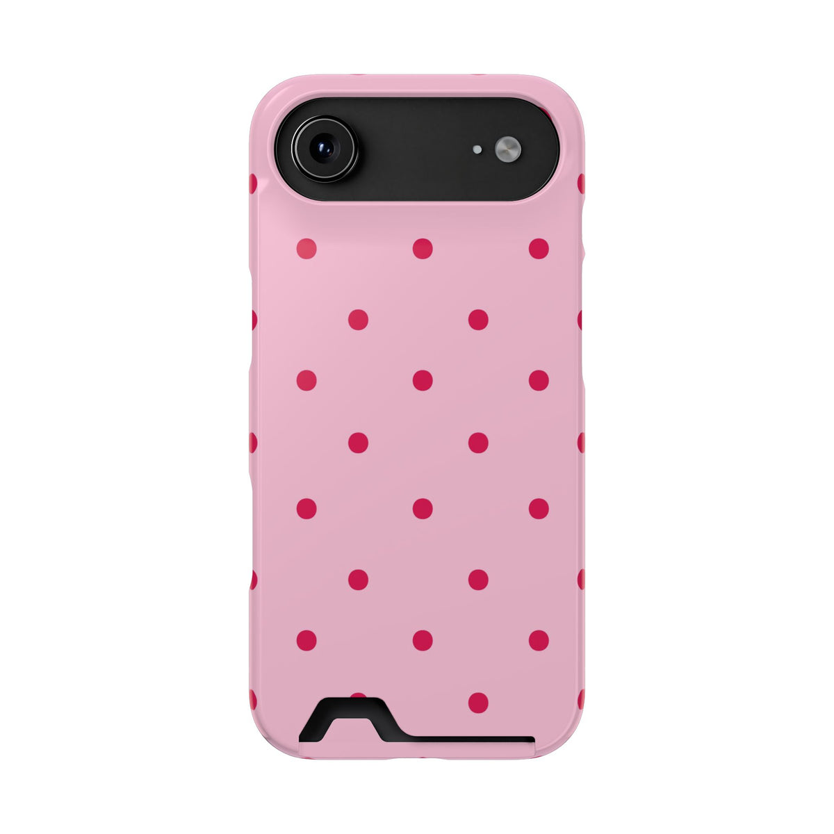 Pink phone case with red dots held in hand