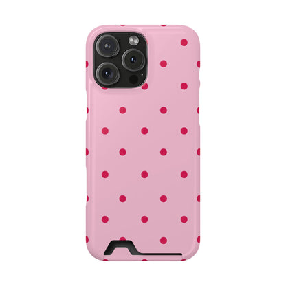 Pink and red polka dot phone case with a card in the slot