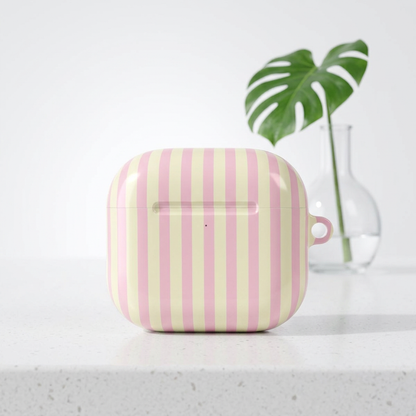 Pink and cream stripe pattern detail on an AirPod case