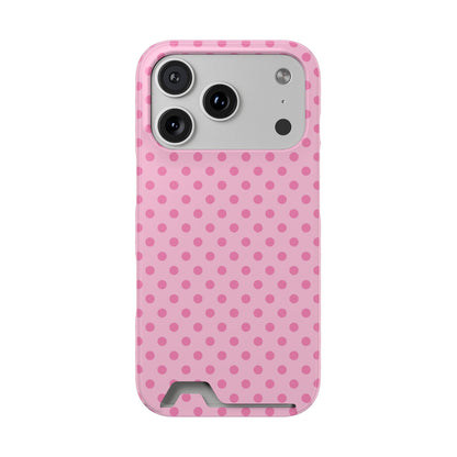 Pink polka dot phone case with a card slot